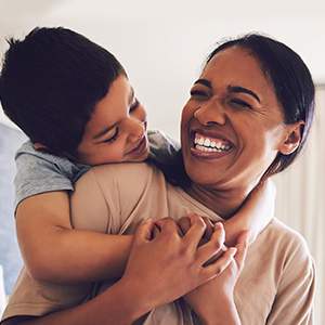 mother and son hugging