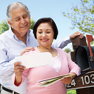 retired couple checking the mail