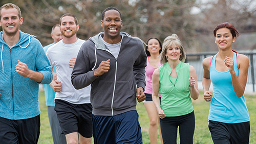 Group of people jogging outside