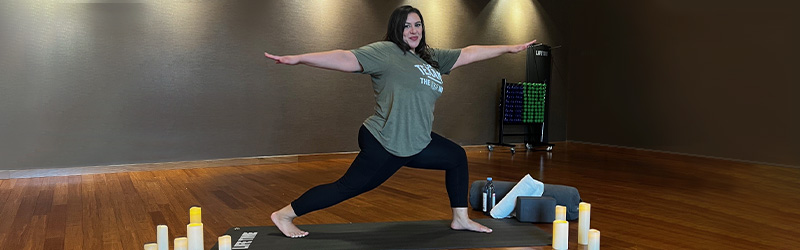 Jennifer Thompson doing yoga at gym