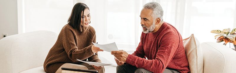 Retiree meeting with an advisor at home