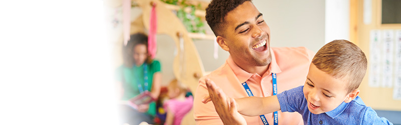 teacher with child at daycare